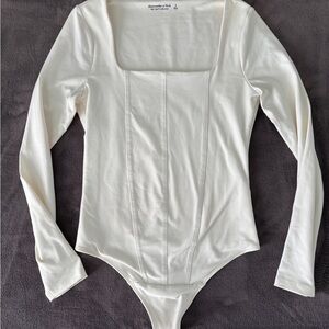 Abercrombie & Fitch Cream Long Sleeve Bodysuit